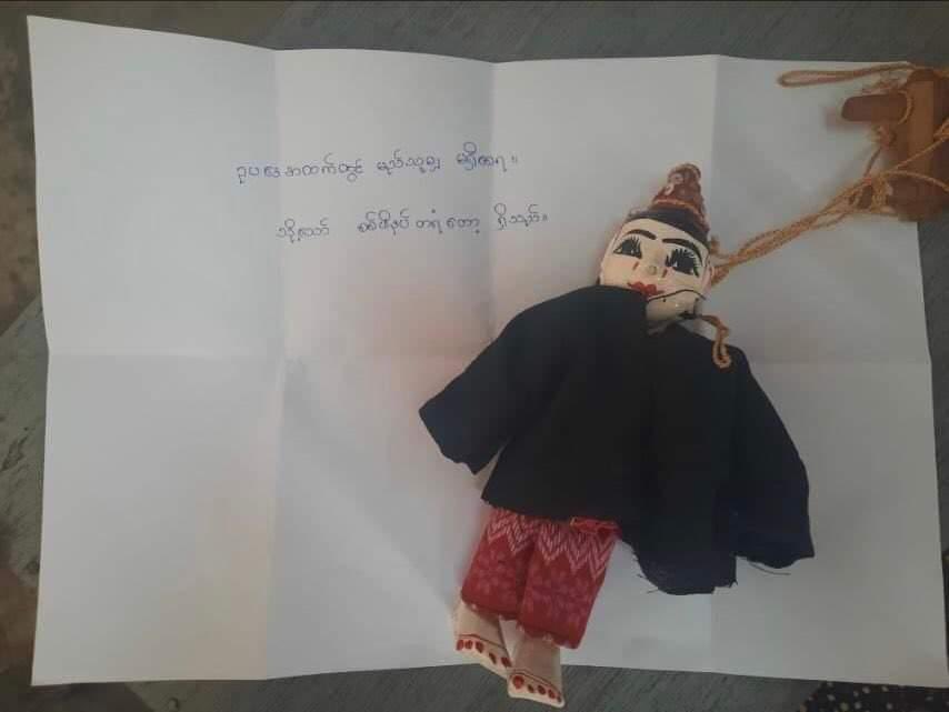 In Insein Prison courtroom, political prisoners presented a puppet to the judge and protested. Puppet was attached with a lawyer coat &amp; a quote, "No one is above the law; but the military boots." #WhatsHappeningInMyanmar #Myanmar