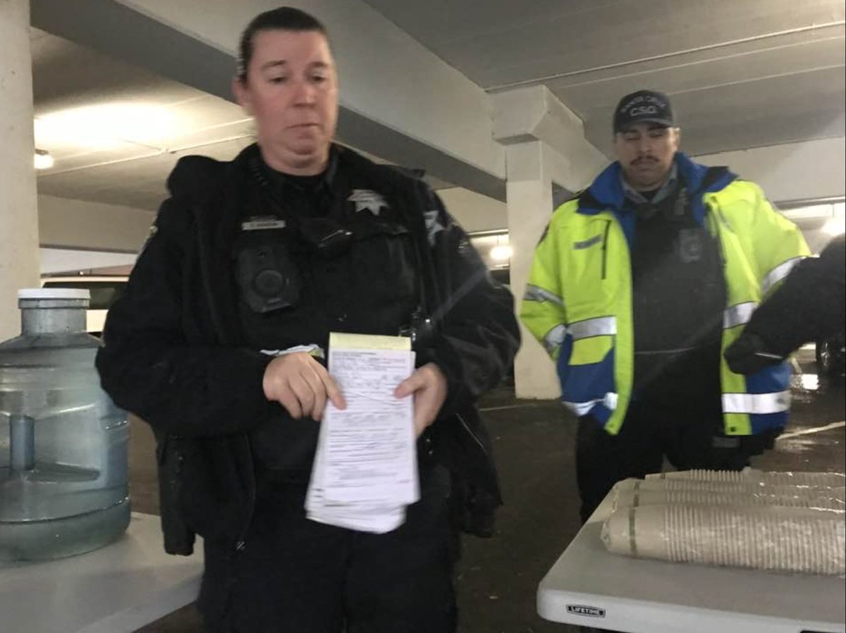 keith_mchenry's tweet photo. I was arrested for attempting to share food to the hungry. We moved into a secluded corner of Garage 10 so people could stay dry during today’s atmospheric river. 6 of our tables confiscated. 
Please contact the city. 
citycouncil@cityofsantacruz.com
mhuffaker@cityofsantacruz.com https://t.co/o8eD1myrV6
