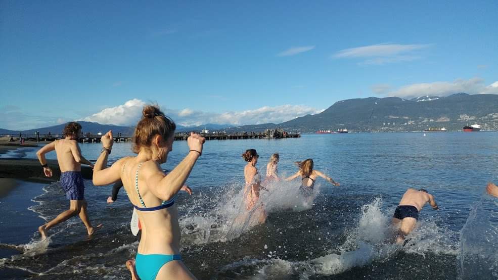 ClubLocarno's tweet photo. Let this photo of our intrepid members &amp; guests from our New Year's Day 2020  shake you out of your turkey &amp; cookie induced torpor!
 Sun. Jan. 1, gather at 10:30, on the water at 11am, followed by the polar bear swim &amp; potluck.
https://t.co/CjytyKkTCj https://t.co/4QTFHhTFWe