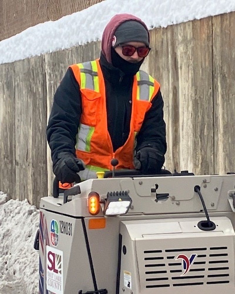 Not only do we plow roads, but sidewalks too! #SLCo Operator Jacob clearing deep heavy snow so pedestrians can use safely. ❄️☃️#publicworks #SLCoPW #snow #plowing #saltlakecounty #utah