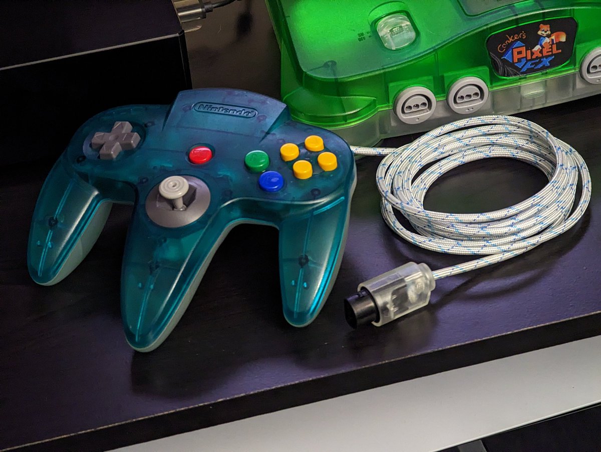 gamrjerome's tweet photo. My first attempt to use a clear plug failed. It's more difficult to remove the plug from the replacement cable over oem. Second attempt was a success. Finished Paracord on this #n64 controller. Plans are a clear #rockergaming gate. Mulling over button options. https://t.co/efQAFAmalQ