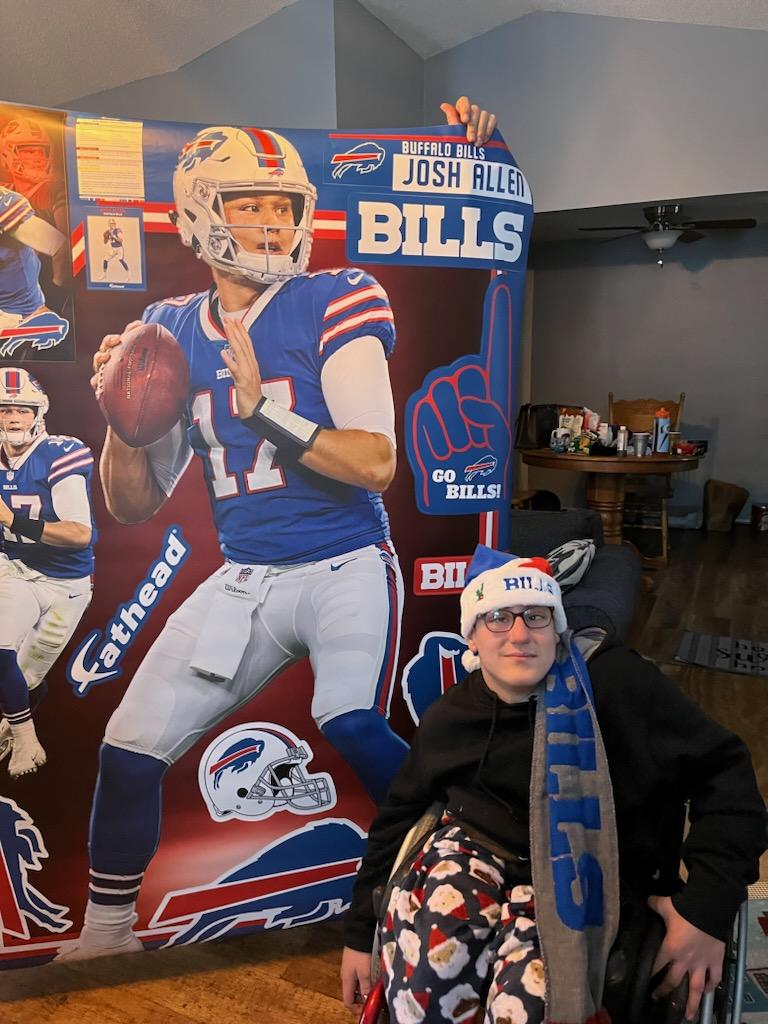 JeaneneVishion's tweet photo. My baby got the best Christmas gift from his Aunt and Grandma! His favorite player in real life! He is so happy!  @JoshAllenQB @BuffaloBills #favoriteplayer #qb1 #GoBills https://t.co/ti7B4aNJJF