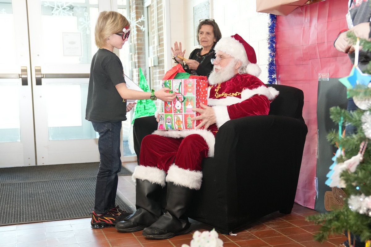 CVESBOCES's tweet photo. Santa visited Mineville last week to deliver some presents early to our students at the Rise Center for Success! He let us take some photos, and we wanted to share them! #CVES #EmbraceOurWhy https://t.co/lAEdXK0CNE