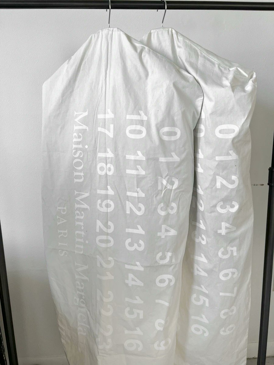 Shtreetwear's tweet photo. Maison Margiela x H&amp;M Belt Jacket (2012) https://t.co/anVetHw1tv