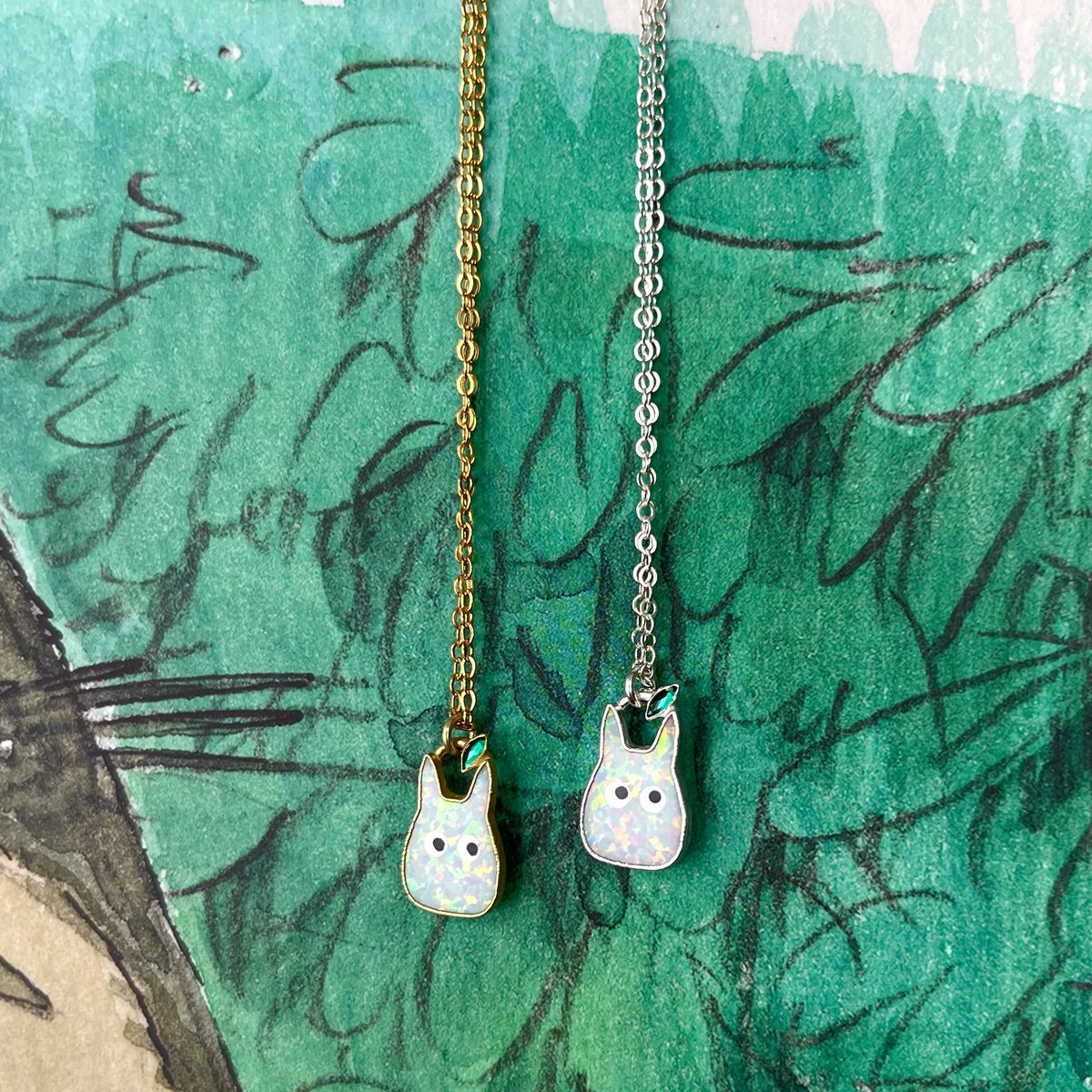lunamosity_'s tweet photo. i made studio ghibli inspired jewelry 🌲🐺✨ https://t.co/EzJI8q8DwU