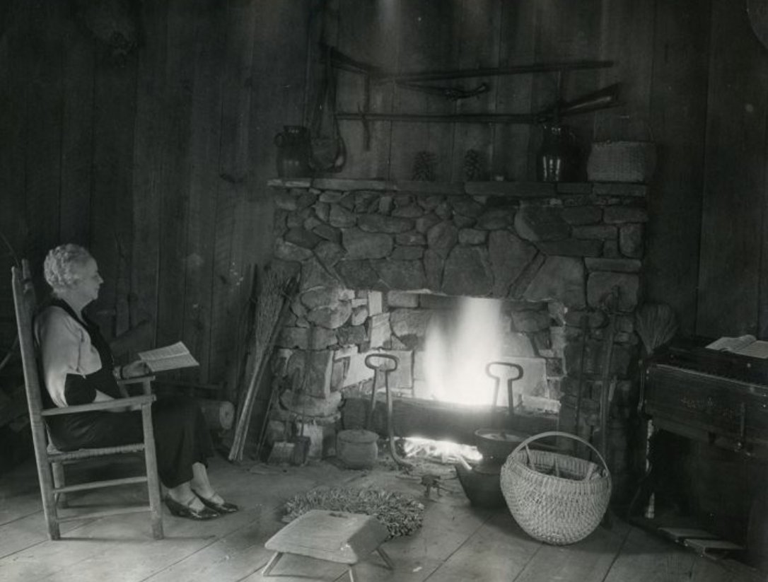 The holidays provide an excellent chance to warm up next to a fire with a good book - just like Martha Berry! This photograph of her in the original cabin was taken in January 1937. What are you reading this week?