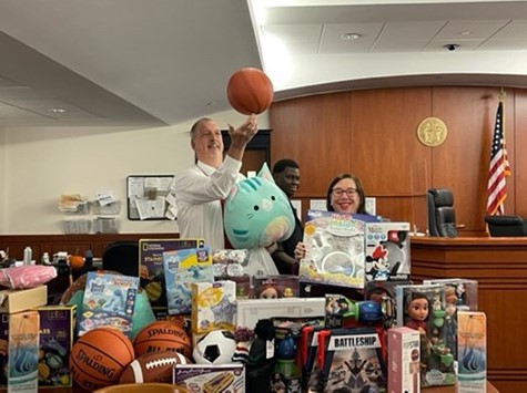 njcourts's tweet photo. The Middlesex Vicinage recently held a holiday toy drive, collecting more than 100 gifts for the area’s most needy. Vicinage staff surprised a #recoverycourt participant who had little food and no gifts with more than 20 gifts for her 7 children and a $375 ShopRite gift card. https://t.co/LLzPj6JE3M
