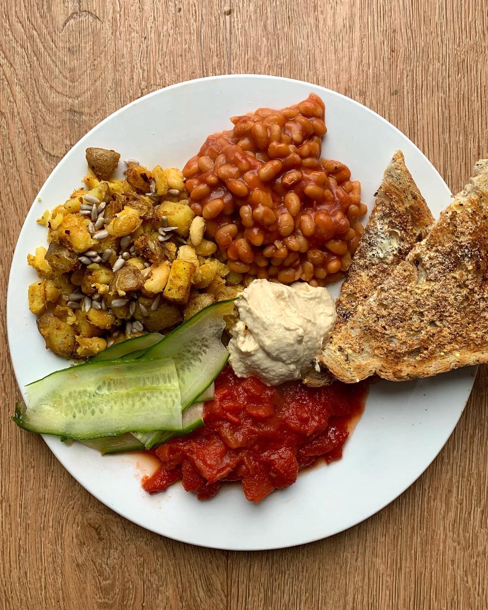 tendaisupply's tweet photo. Brunch of the day. #dEATS:

- ‘Cubed’ potatoes sautéed in oil with seasonings and dash of baking powder to crisp. Includes cannellini beans + sunflower seeds
- Tinned tomatoes cooked in saucepan and reduced
- Leftover cucumber cut with cheese slice
- Hummus
- Toast
- Baked beans https://t.co/4q9Mjc7VqG