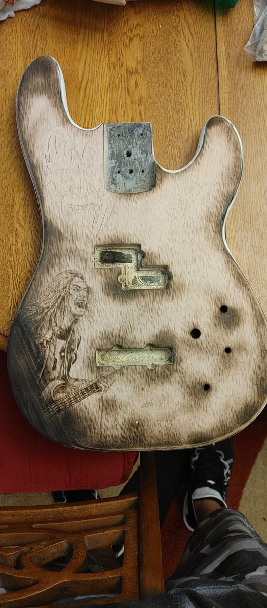 jason_baxtrom's tweet photo. Wood burned a bass guitar for a buddy of his 3 most influential musicians in his life as a thank you gift . Let me know what you think .#woodburning #Metallica #KISSARMY #GunsNRoses @DuffMcKagan @JamesHetfieldMF @genesimmons https://t.co/NAlxVoV9u1