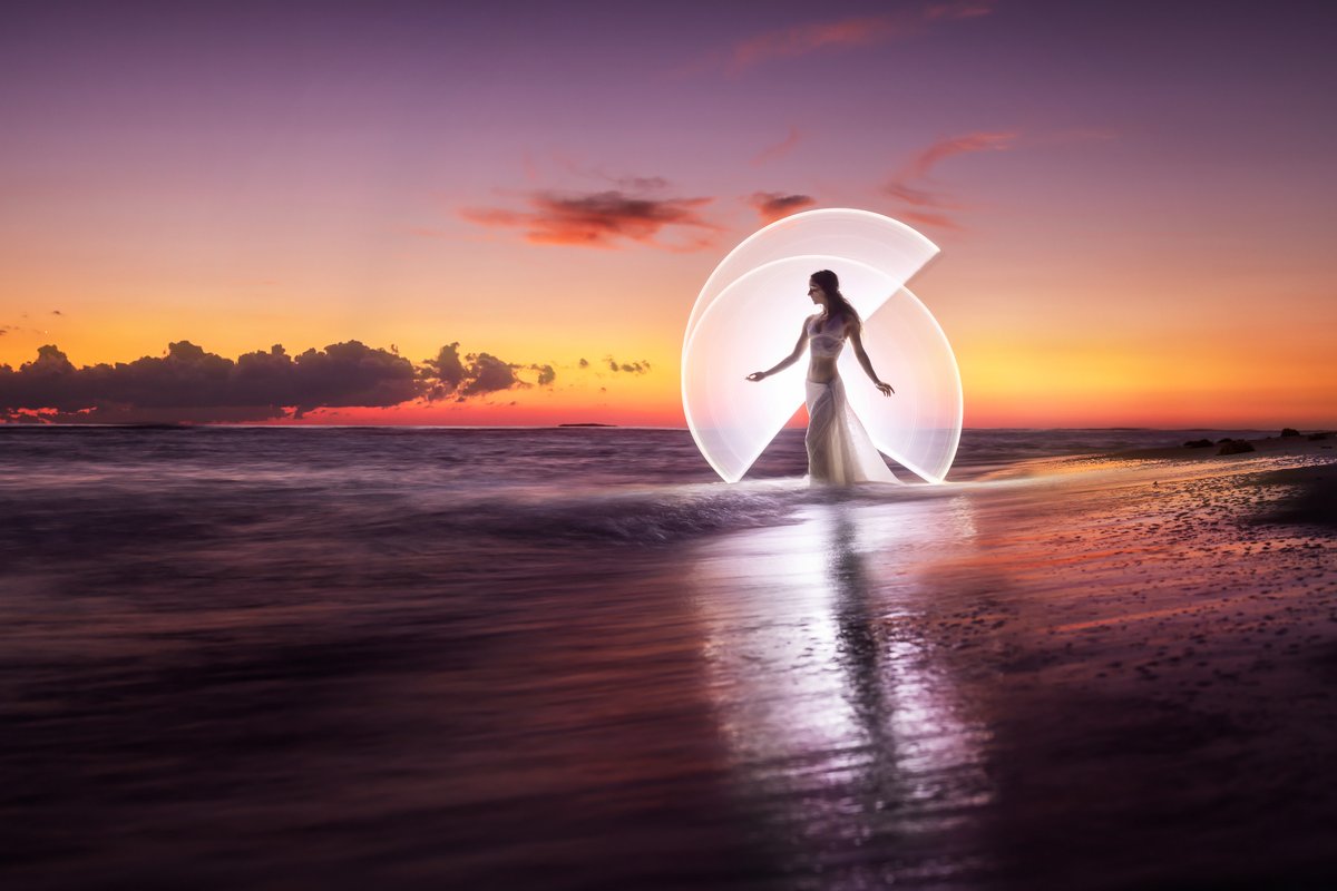 Suuuuuuuuuuuuuuper happy to release this one today!! We created this long-exposure photography last week at the beach. These are not usual colors for us 😄😄 Check out the behind-the-scenes in the tiktok link below 💛💖💙⚡🍦