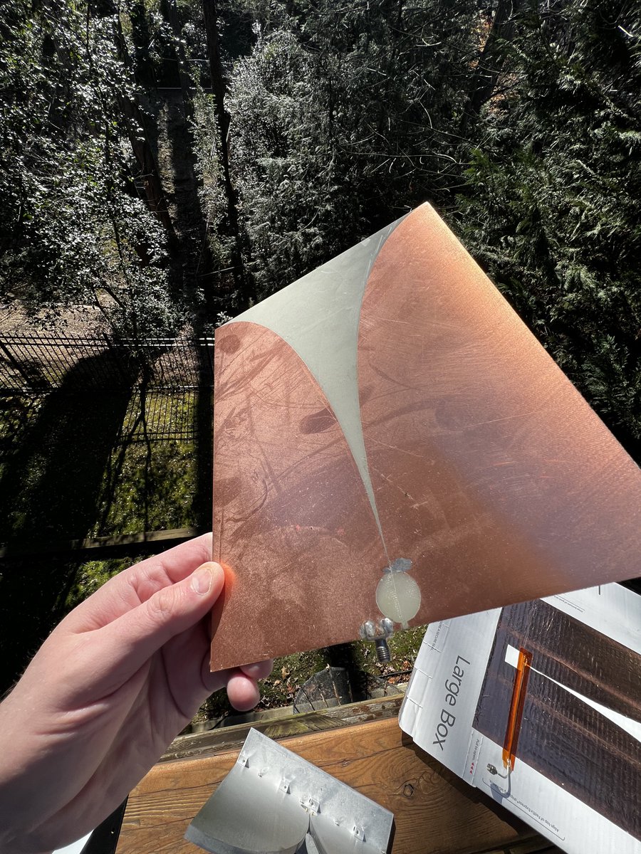 Fedex boxes, copper tape and exacto knives are your friend. This was my first Vivaldi antenna that turned into a PCB version. The first metal version had adjustable spacing between blades to find best matching. #antennas #rf