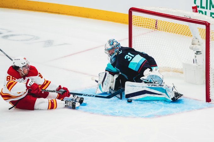 grubi making save during calgary game