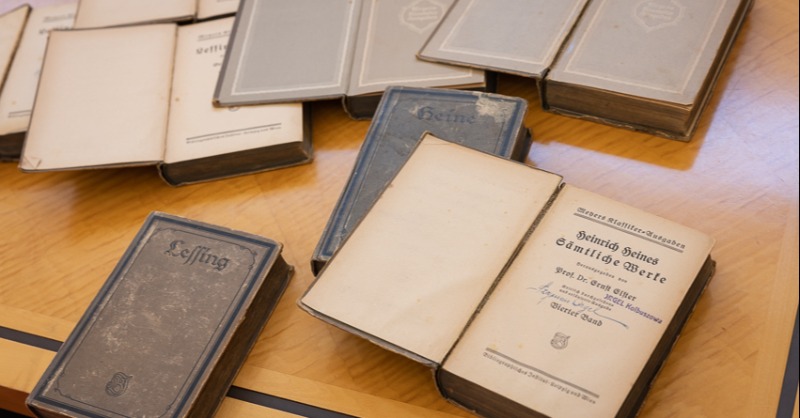 HolocaustMuseum's tweet photo. This month, Holocaust survivor and Museum volunteer Maryla Orgel Korn was reunited with books once owned by her father, Szymon. Maryla and her parents survived the Holocaust, but most family belongings were lost during the war. The books were recently found in a home in Germany.
