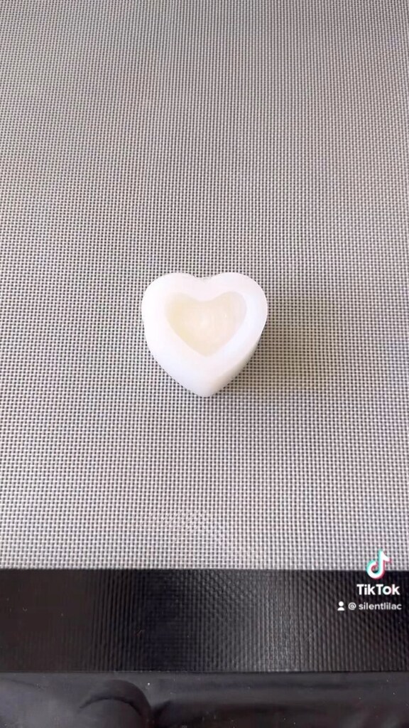 Had to use this sound for a resin pour of a heart. Using up the last of the sparkly white. Demold tomorrow! Maybe I’ll make it a keychain!  #silentlilac #stockingstuffers2022 #stockingstuffers #resinmold #crystalmold #resincrystals #resincrystal #resinmo… instagr.am/reel/Cmv6pIZqe…
