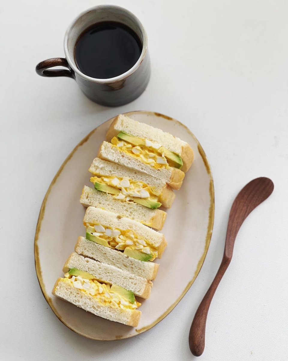 My breakfast: poached egg and avocado sandwich on lemon bread The extra sweetness of the lemon zest is just right ✨😋