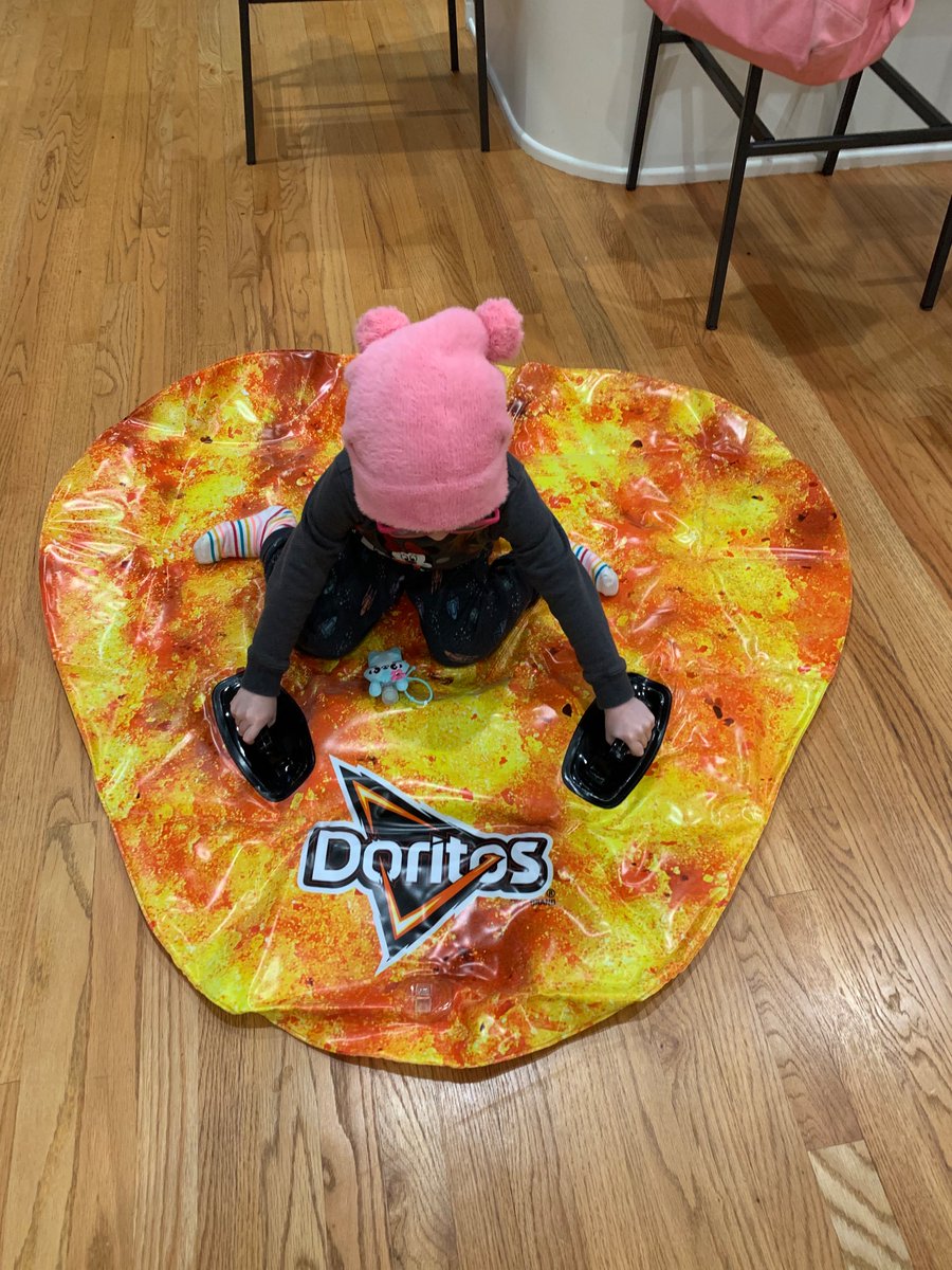 thenoreenTM's tweet photo. I do love that I’ve cultivated a life where Doritos-shaped snow sleds just appear at my door, but I do wish I knew who sent it. https://t.co/ML1vxU1c5m