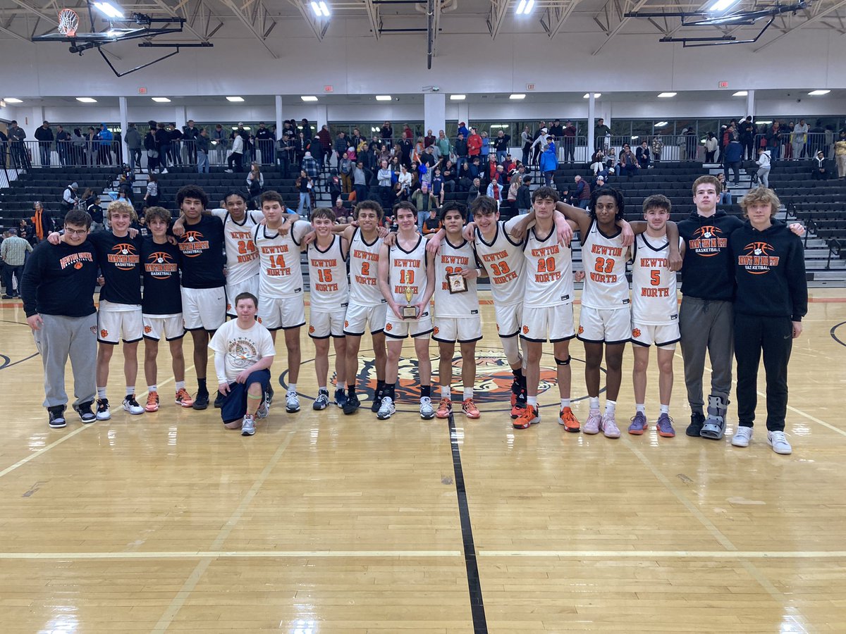 NNHSTigers's tweet photo. Tigers with the win! Jose Padilla with the game winner in OT! 61-58 final! Garden city champs! https://t.co/VaKca2Sazq