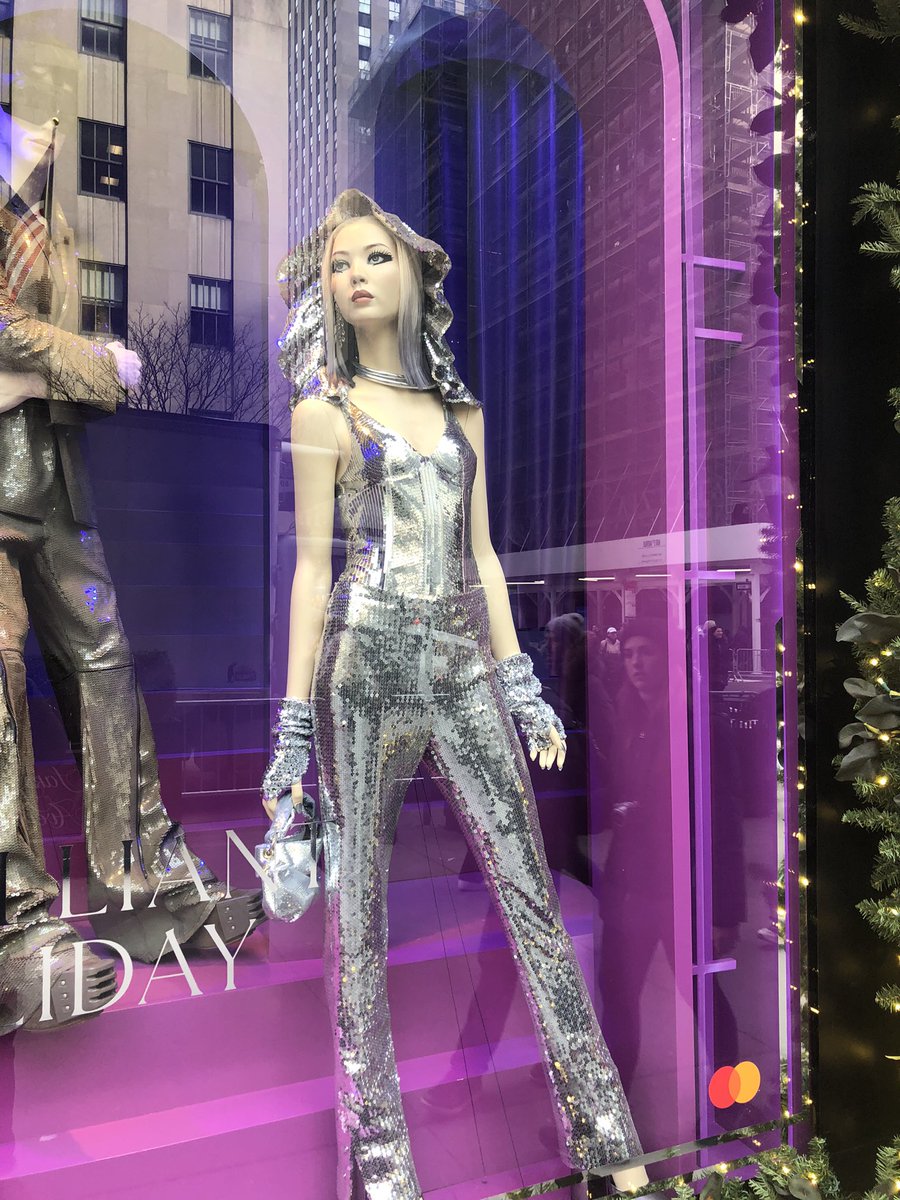 Catherinex007's tweet photo. Finally made it to @saks  to view the fabulous window displays #SaksHoliday   Best window display had a beautiful mannequin that was cloned after my daughter Ava!!   My husband snapped a quick photo of us as we were leaving!  Looks exactly like my daughter Ava! https://t.co/hJWghm8d66