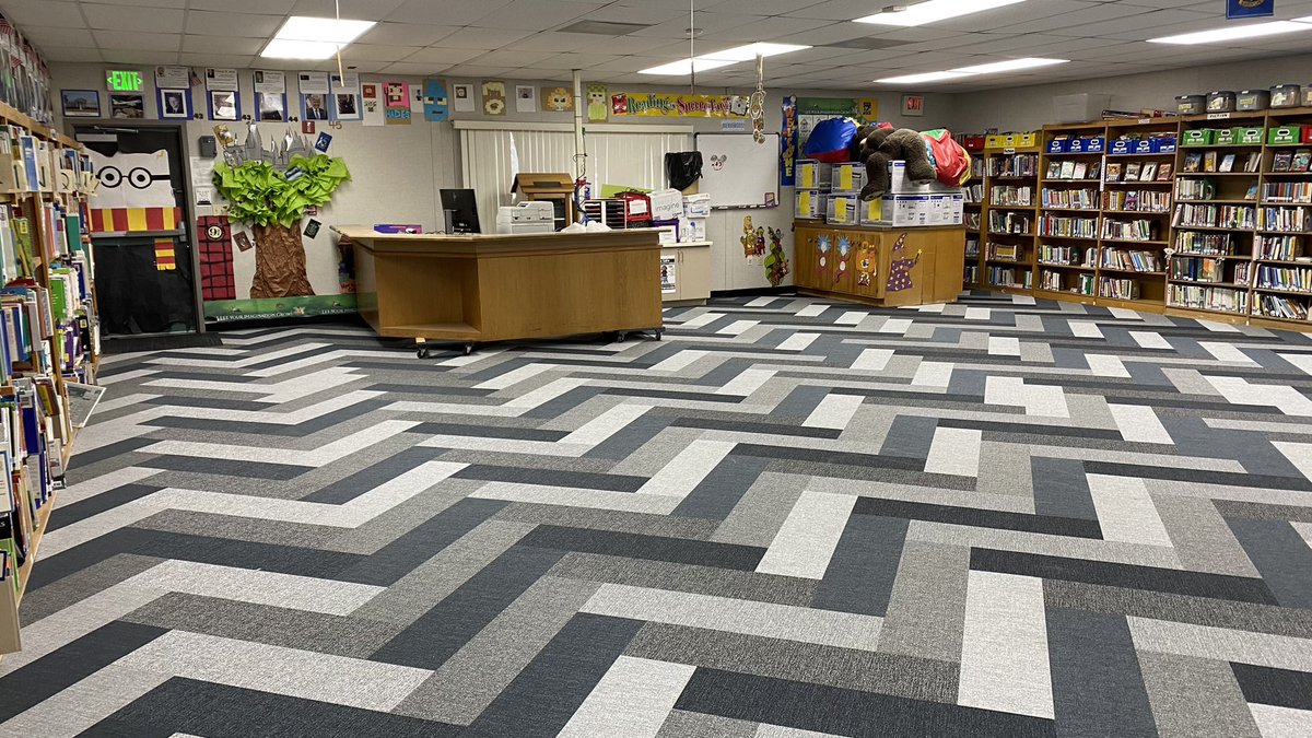 NSD_Castillo's tweet photo. We started the new flooring on two of our libraries this break. With two more scheduled for Spring Break. #NSDnow @OwlieWood @NSDLeighangela https://t.co/YrSKuCMO59