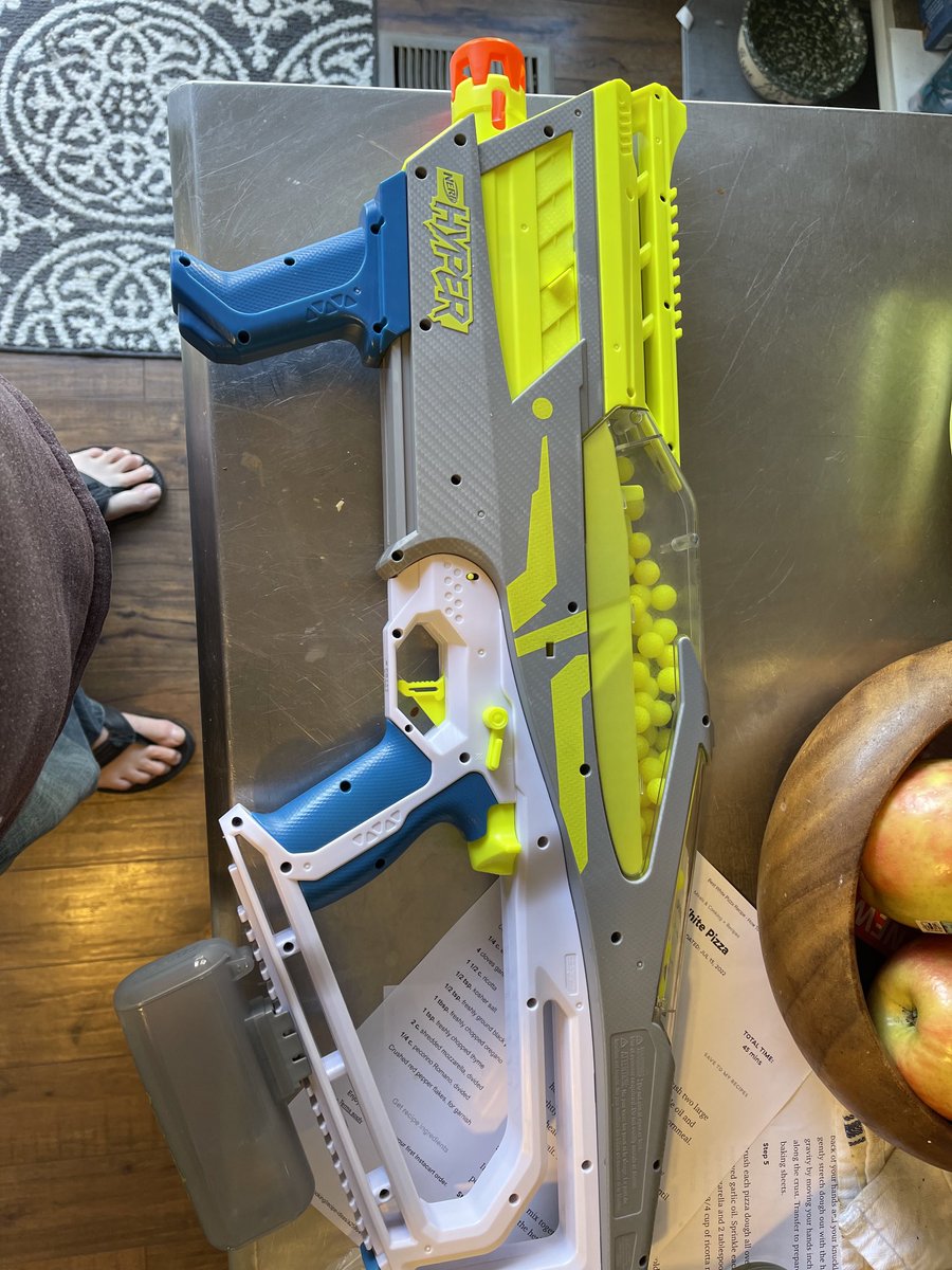 RobCarson's tweet photo. My son got this Nerf gun for Christmas. This is not a toy for a little kids. When you get shot with it, it really freaking hurts. As someone who grew up with BB guns and lawn darts, I commend Nerf for not selling another wimp ass toy. #nerf #nerfhyper https://t.co/T3RUMEK3SU