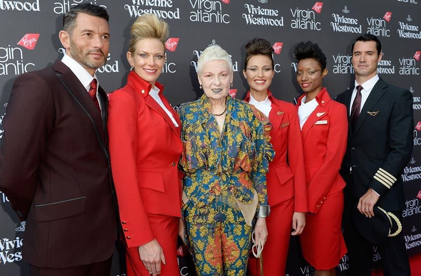 VirginAtlantic's tweet photo. Rest in peace Dame Vivienne Westwood. A true British icon and the visionary behind our iconic uniform design that we’ve been proudly wearing since 2014 ❤️ https://t.co/ZoJayJMgmE