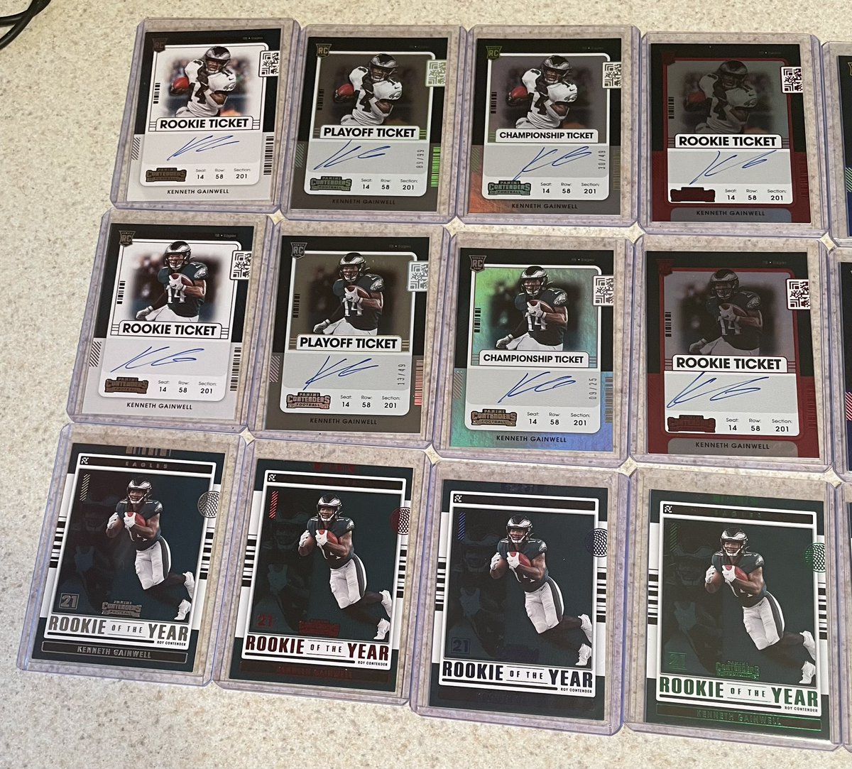 TJ_Hester_'s tweet photo. A @KENNETHGAINWEL Rookie Ticket update: in the past 6 months, I’ve been able to bring the collection from 28 to 33 unique cards. Missing the 6 other printing plates, the 1/1s, a die cut, a few Playoff preview colors, and a Fanatics exclusive rookie of the year, but I love this PC https://t.co/Kfnc4nbEi4