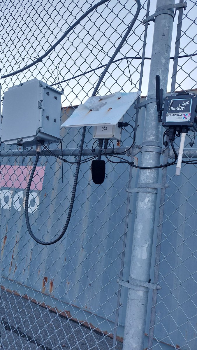 VA1PKK's tweet photo. Libelium noise level sensor monitoring industrial sound pollution. Strategically placing a shipping container to block the true sound pressure level measurements. Libelium ensures each device is verified in an independent test laboratory, but who verifies the setup stays true? https://t.co/SrUN108Azt