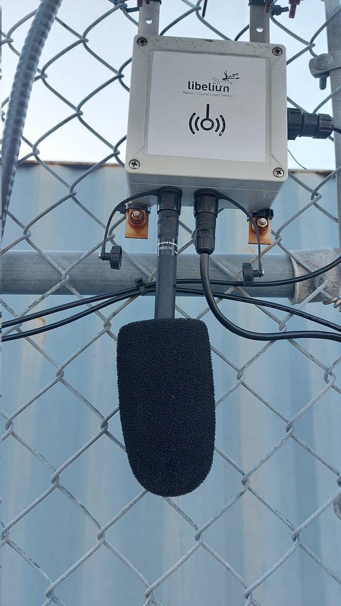 VA1PKK's tweet photo. Libelium noise level sensor monitoring industrial sound pollution. Strategically placing a shipping container to block the true sound pressure level measurements. Libelium ensures each device is verified in an independent test laboratory, but who verifies the setup stays true? https://t.co/SrUN108Azt