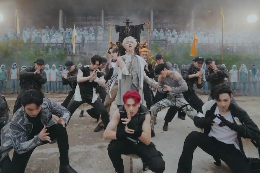 soompi's tweet photo. WATCH: #ATEEZ Expresses Hope In Powerful "HALAZIA" Comeback MV 
https://t.co/Kl0Ux4HIky https://t.co/OxO0KFb26W