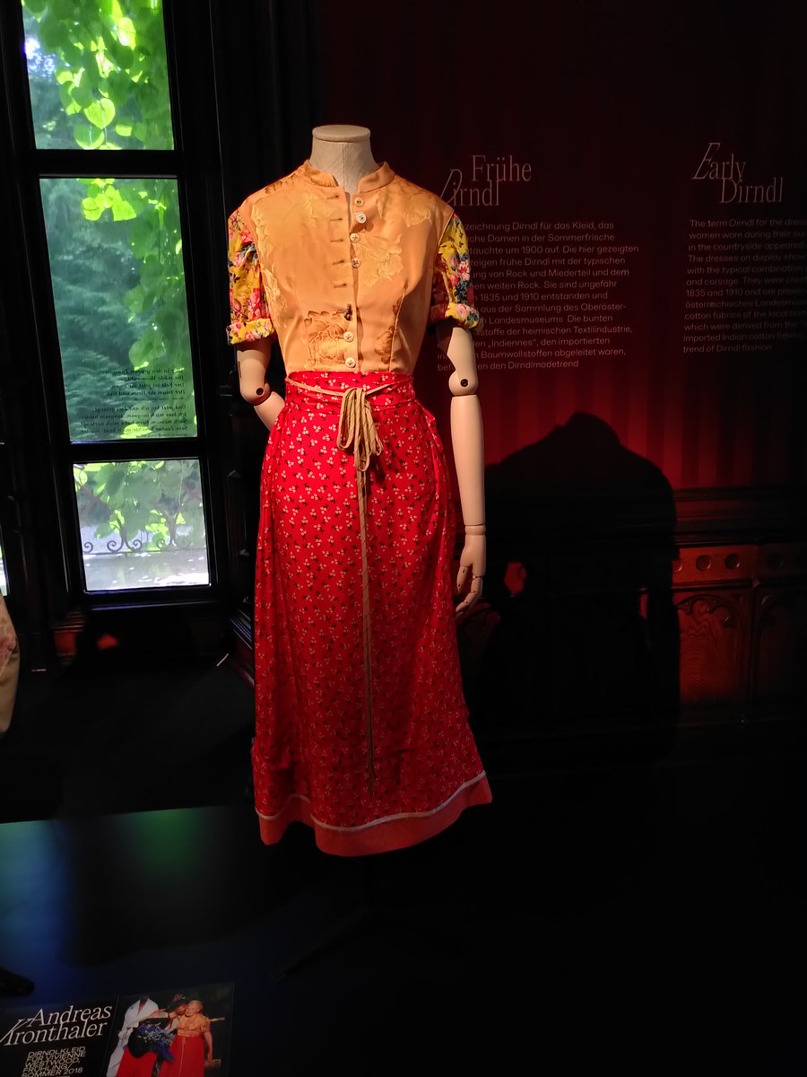 DirndlThe's tweet photo. it was a great honour to have our surcot in the same exhibition with the Westwood dirndldresses in bad ischl. RIP, #VivienneWestwood! Your inspiration for the "reclaim-the-dirndl"-movement will be forever💜 https://t.co/Wxgp8Vph6c