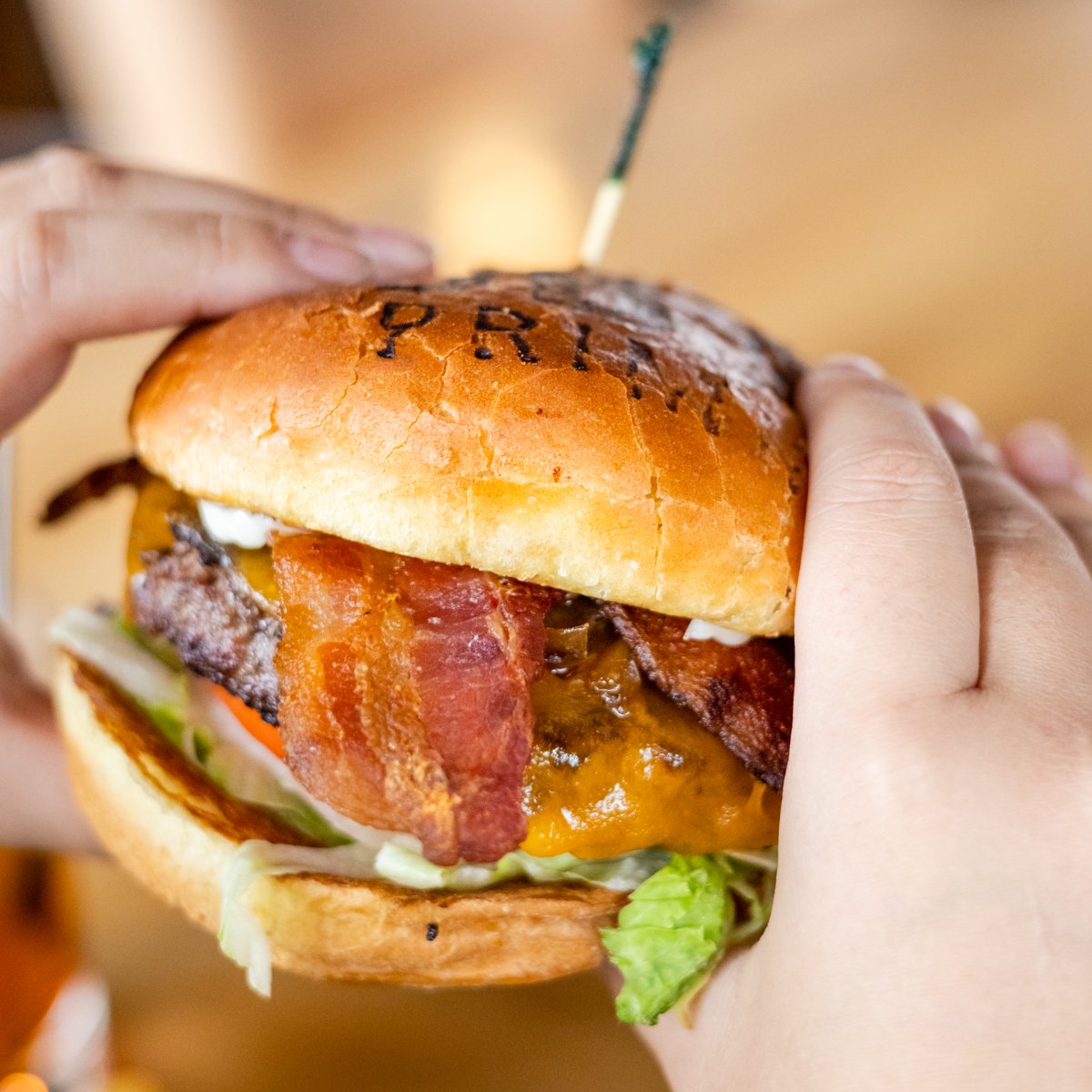 OBTSudbury's tweet photo. End 2022 right: with the perfect last bite of our bacon cheeseburger. 🍔🤤 #OakBarrelTavern #RusticTavern https://t.co/Og7iEEjtzA
