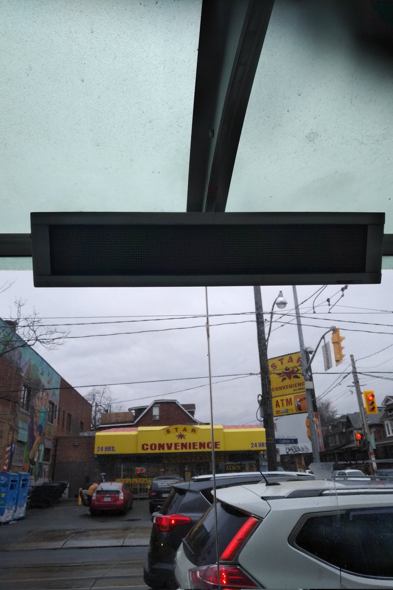Far_Fallen's tweet photo. .@TTChelps this pixelated notice board has been out of servIce for an entire calendar year! South West corner of Dufferin and College. Any plans to fix it this decade? https://t.co/27HlWiLo3K