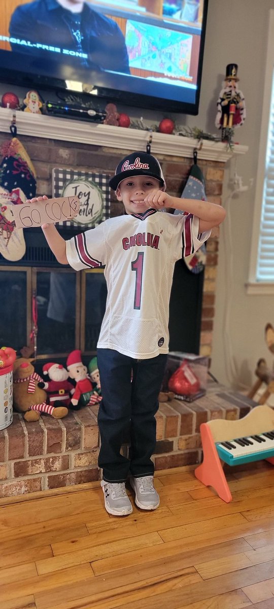 @GamecockFB and @CoachSBeamer this #1 fan went to most all the home games this year, stormed the field after Tennessee, and is ready to cheer on the team today from home in his new Carolina jersey! #GoCocks #USC #gamecocks
