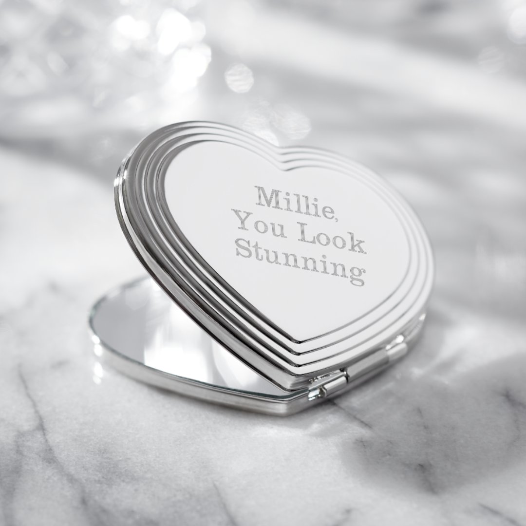 New Product Alert! 🚨🚨🚨 The perfect gift for the glamorous girl on the go, our Silver Heart Compact Mirror makes it easy to touch up her makeup no matter where she travels. cstu.io/ba81b6 

#giftsforher #compactmirro #mirror #beauty #personalization #personal #gift