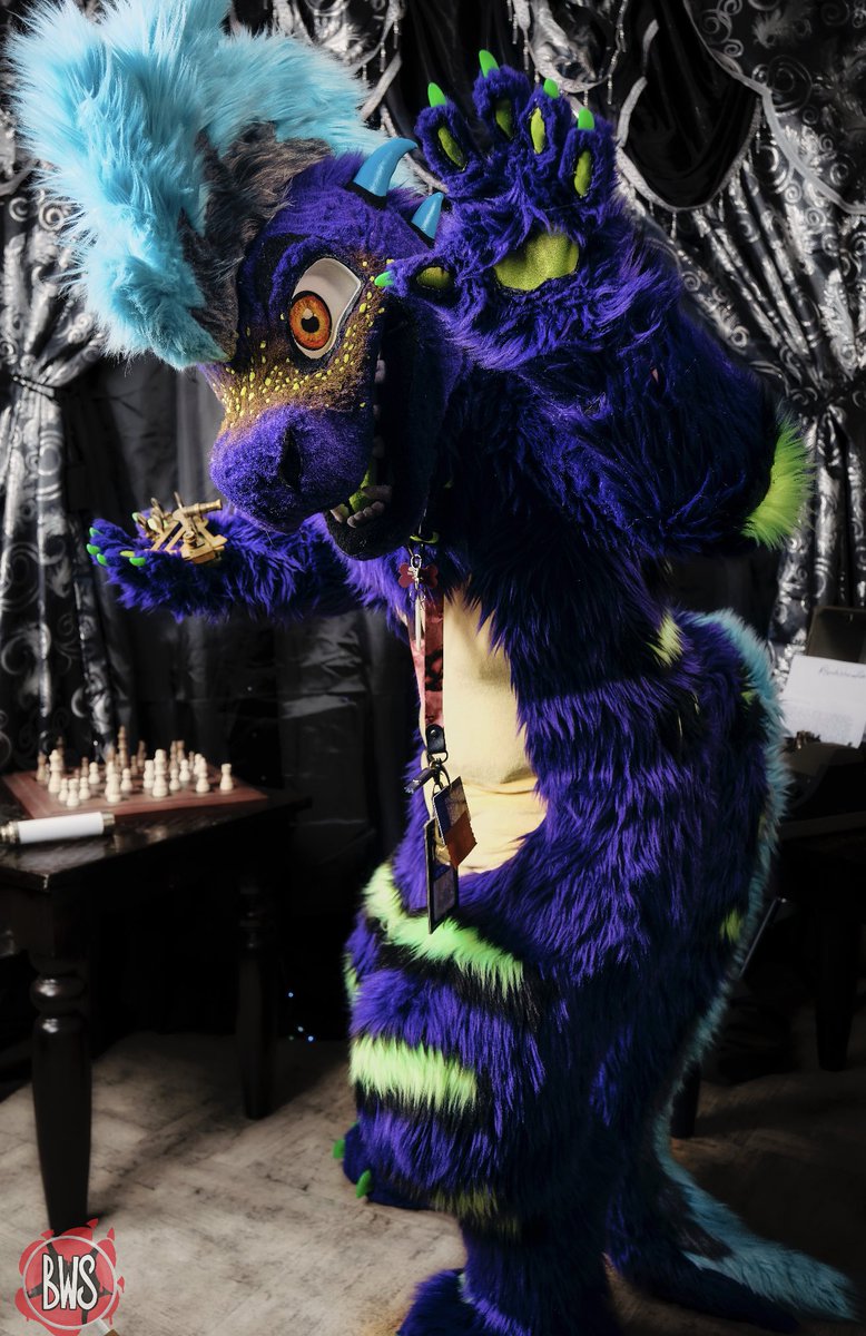 It’s the last #fursuitfriday of 2022! 
@Montydragon2 is looking forward to the new year! 🎆
What are your New Year’s resolutions? 

📸: <a href="/BlackthorneFoto/">Blackthorne Photography</a> on Twitter 
#bws2022 #bewhiskeredcon