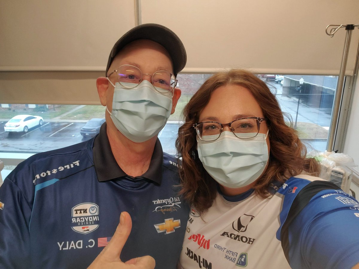 IndyCarTeach's tweet photo. Dad (@outlawpete500 ) and I at his chemo session. Wearing our newest Christmas gifts. @GrahamRahal and @ConorDaly22 Conor any chance you need a guest on your next podcast? https://t.co/6emqlC17lu