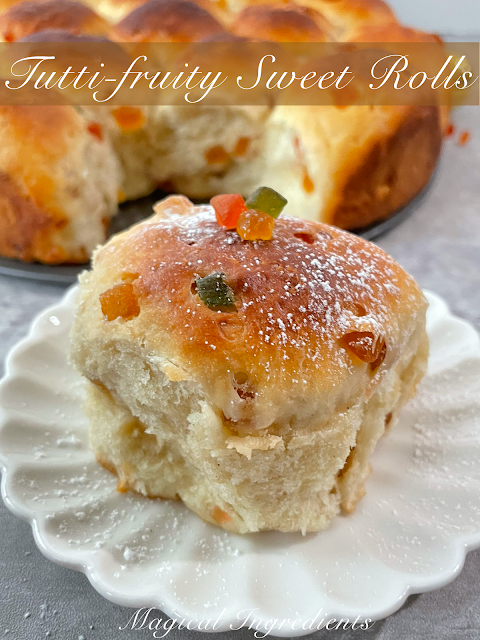 These #tutti-fruity Sweet Rolls are soft and #sweetrolls that make the best #breakfast or #snack. These sweet rolls are #eggless and easy to make.  #bread #egglessbaking #comfortfood  go.shr.lc/3hWjurz