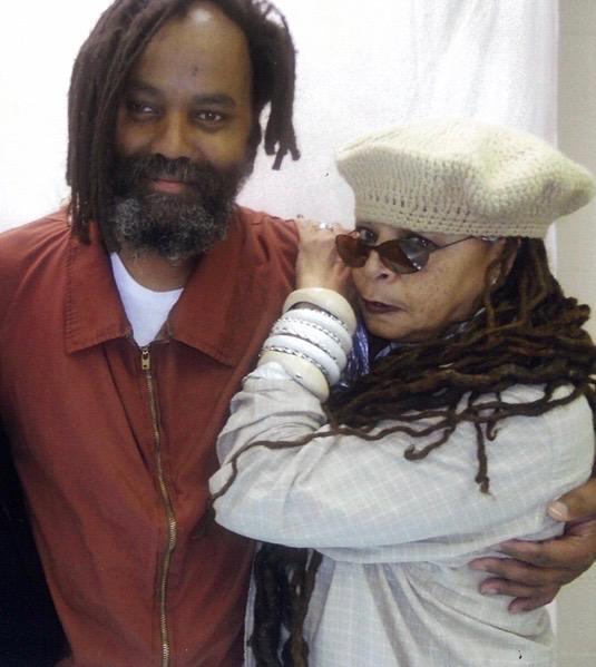 sfbayview's tweet photo. Political prisoner #Mumia Abu-Jamal’s wife #Wadiya Jamal recently passed away. We send our highest salute to the life of Wadiya Jamal, our most sincere condolences to Mumia, the Jamal family and her comrades and loved ones. https://t.co/D5JOMqqNsl #RestInPower https://t.co/ZPZZlR6u5N