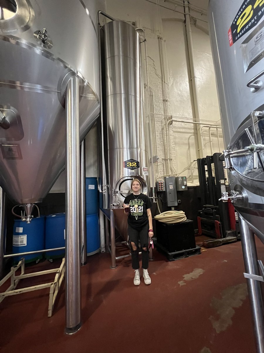 JacobLettuce's tweet photo. Lex is for scale, these brewery holding tanks are huge https://t.co/LcWcdcqzXb