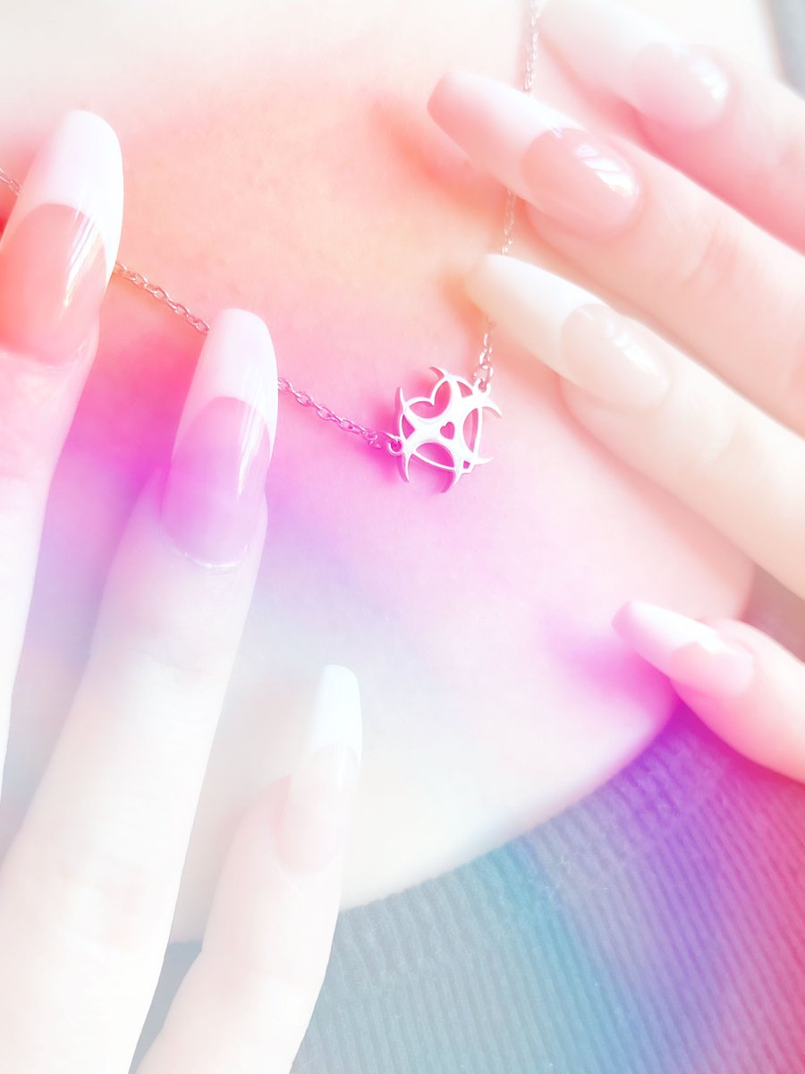candycorpse's tweet photo. Silver Icon Necklaces are finally back in stock! Shop now during our end of year sale for $10 off $50 with code BOXINGWEEK22 💖 https://t.co/NtH8Z6kbLj