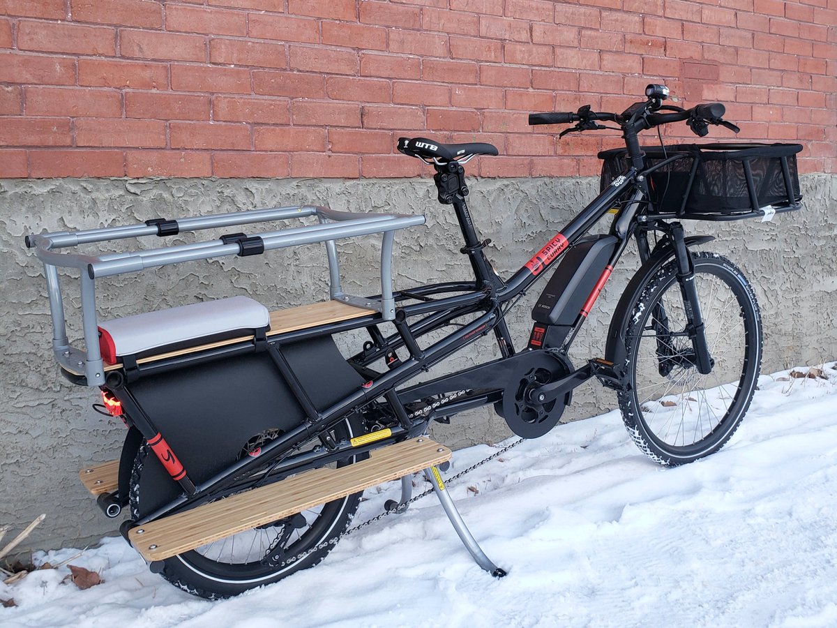 BikeBikeYYC's tweet photo. If you're passed by a bright flash of black/red today, that'd be Amanda flying home on her new Yuba Spicy Curry AT #ecargobike. Have all the fun out there! #electricvehicle #familyvehicle #ebike #joymachines #OneLessSUV https://t.co/5oMvQFioBZ