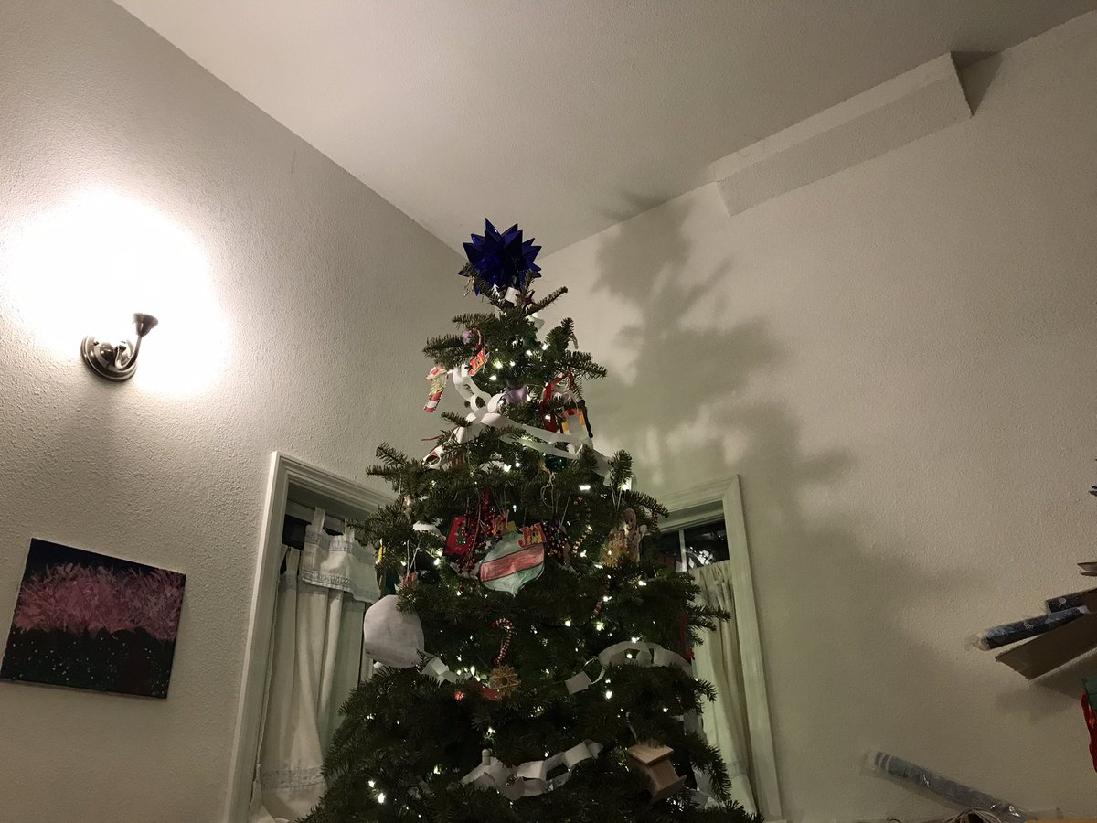 directrex's tweet image. Made this purple star too atop our little tree!  Quite an enjoyable origami fold that I originally developed for my son Adin years ago. This is the 2nd one ever made.