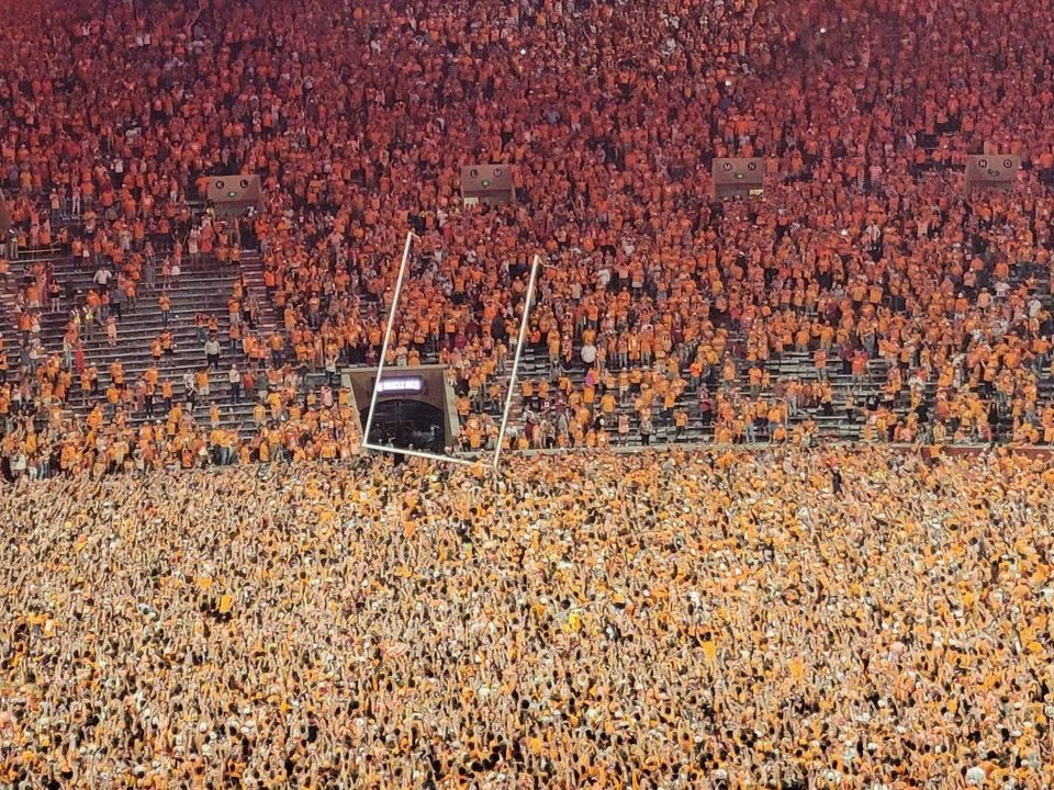 LIVE LOOK: Tennessee fans storm the field to help Clemson's B.T. Potter make a field goal. #TENNvsCLEM #CapitalOneOrangeBowl