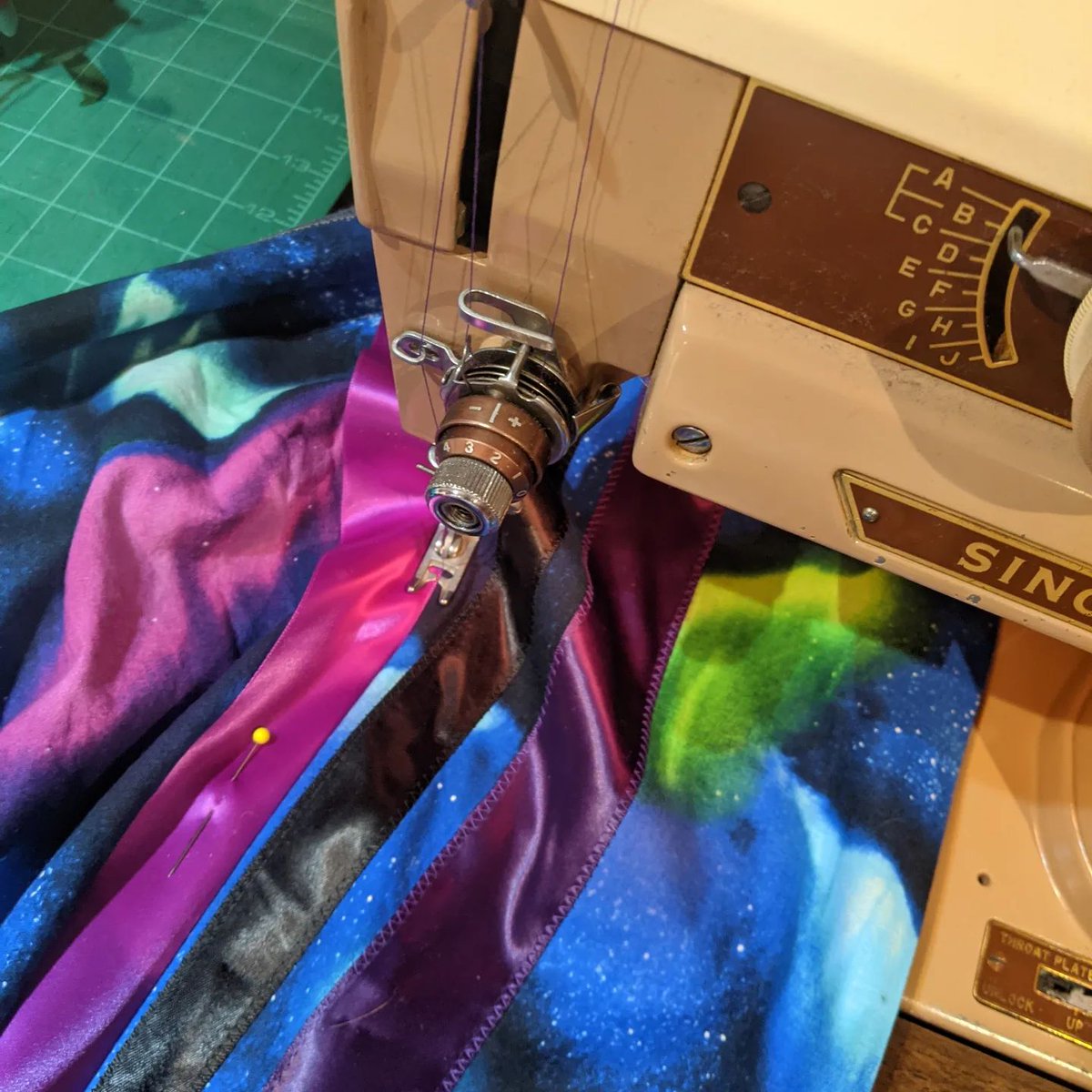 StoonStitcher's tweet photo. Classic @officialskidrow on the speakers and #RibbonSkirt s under the sewing machine needle. It is a good day to prepare for #NationalRibbonSkirtDay on January 4, 2023. https://t.co/UKhXDn6xpu #skidrow #heavymetal #singer401 #seing https://t.co/7H2bVjYFWo