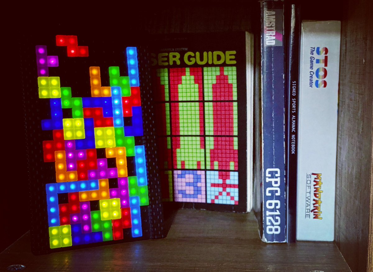 YorkshireTechy's tweet image. My #usermanual shelf with the #tetris light on it! Looks pretty cool! 

#amstrad6128 #bbcmicro #stos #programming #basic #tetrislight #RetroComputing