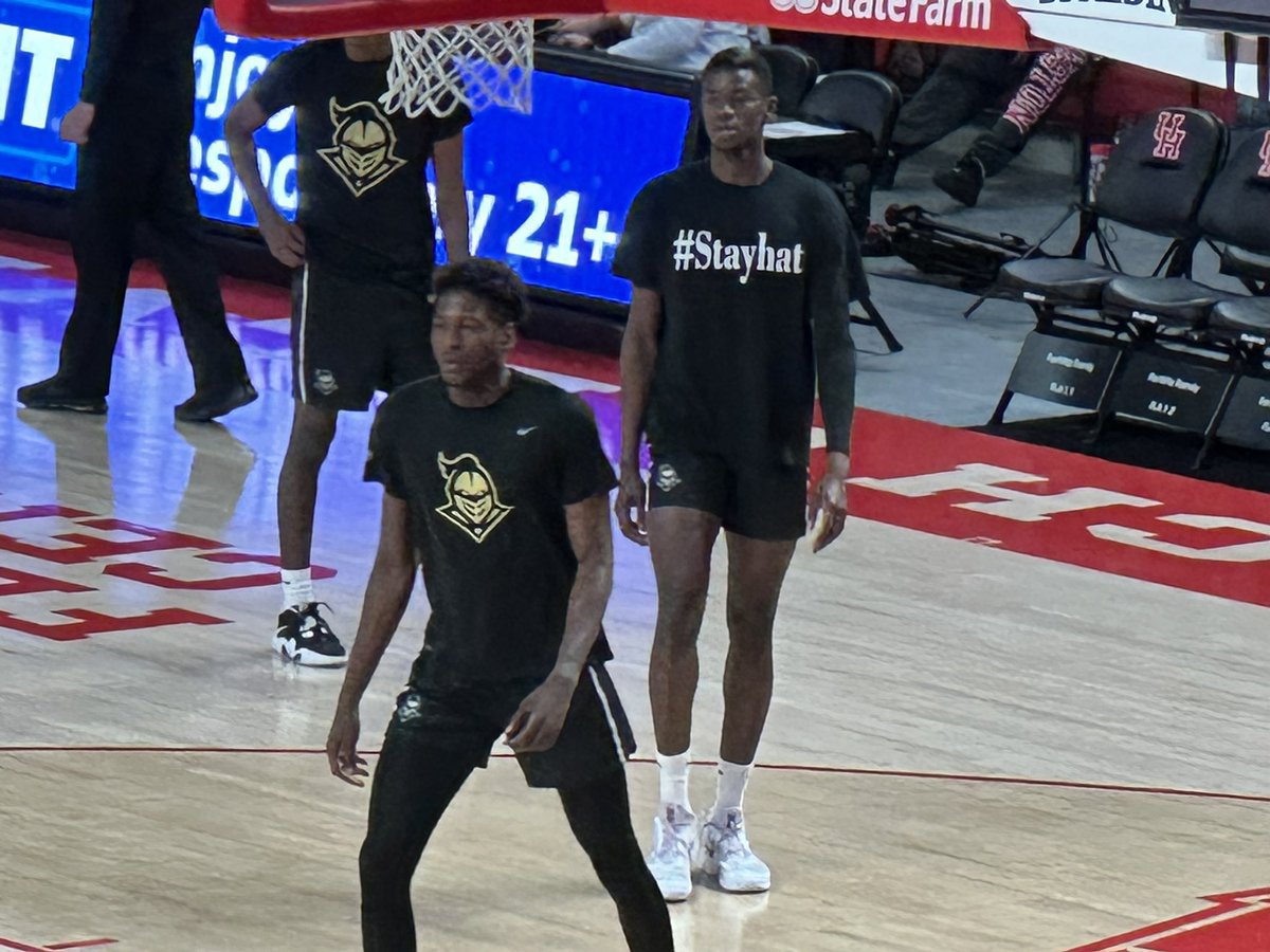gocoogs1's tweet photo. UCF senior forward Lahat Thioune is from Senegal and played his first 3 years at Utah.
During pregame, he wears a shirt with his own hashtag - #StayHat. https://t.co/mDZkFkvehx