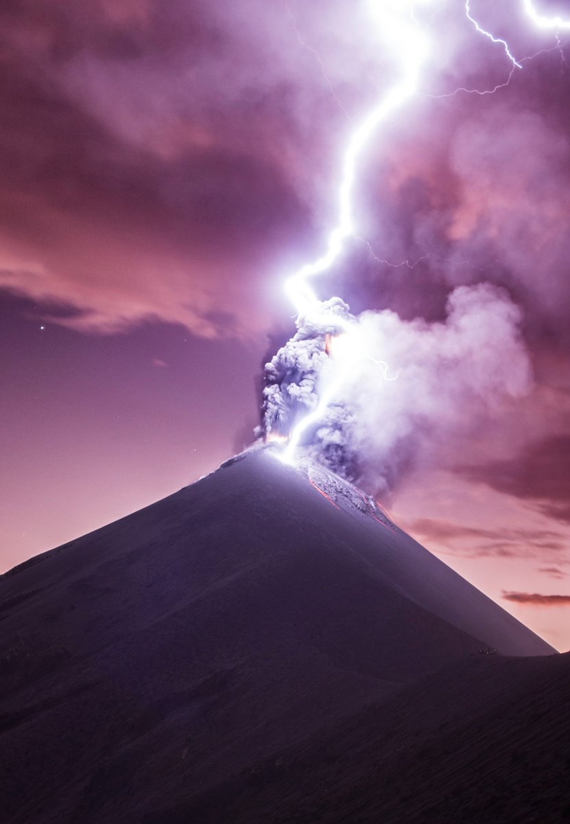 mortom's tweet photo. My son Eric is hiking in Guatemala and shot this picture of lightning striking an erupting volcano!  I have better luck with sunsets, they move a little slower.  I believe that is Venus on the left. https://t.co/59ocbANqdi
