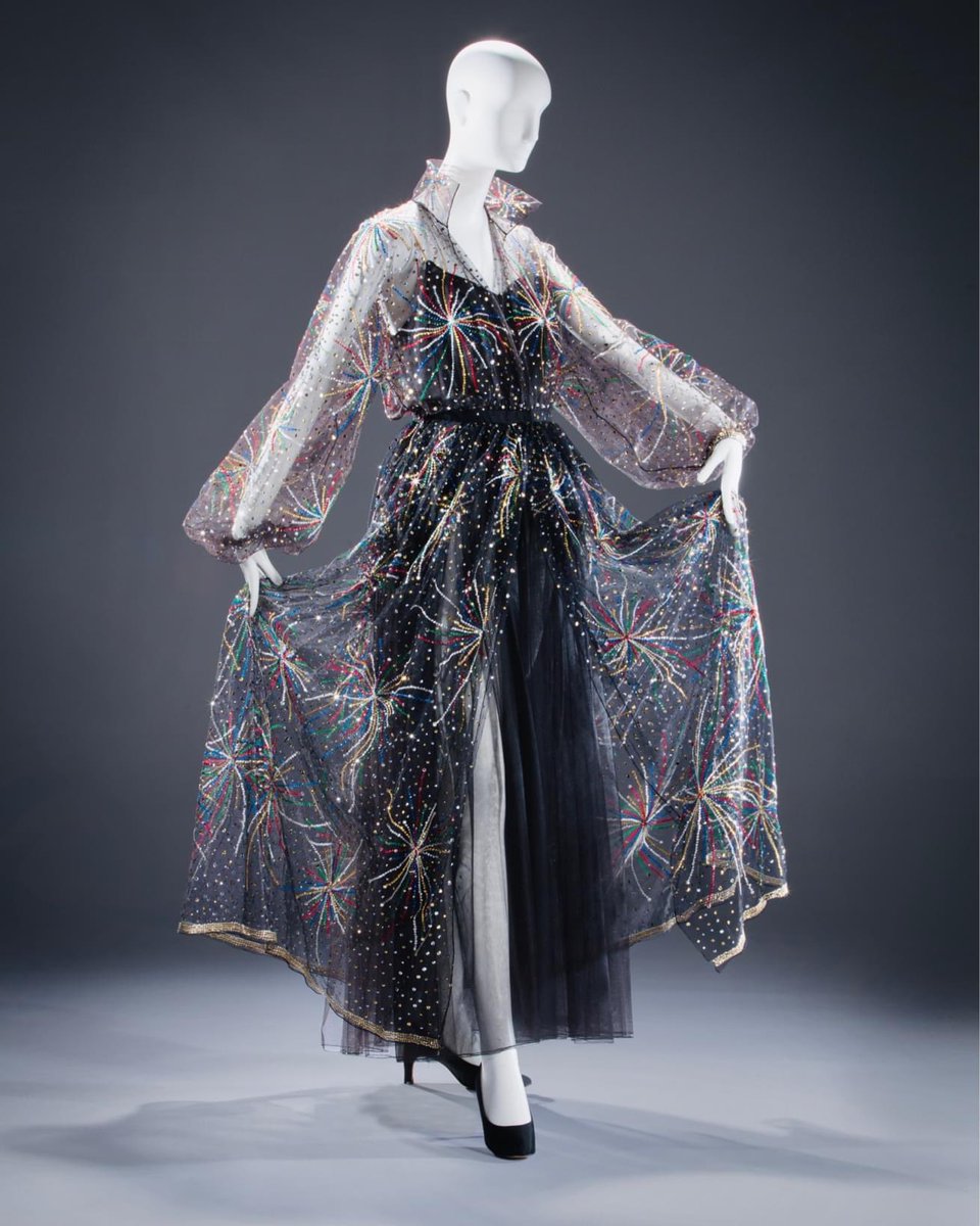 vickyhaddock's tweet photo. 🎆 Happy New Year 🎆 Ring out the old, ring in the new! I am going to say goodbye to 2022 and embrace 2023 in Halston's sheer sequin fireworks ensemble from his Fall 1980 collection. @FIDMMuseum collection.  #NewYear #happyNewYear2023 https://t.co/72TlcupCkd