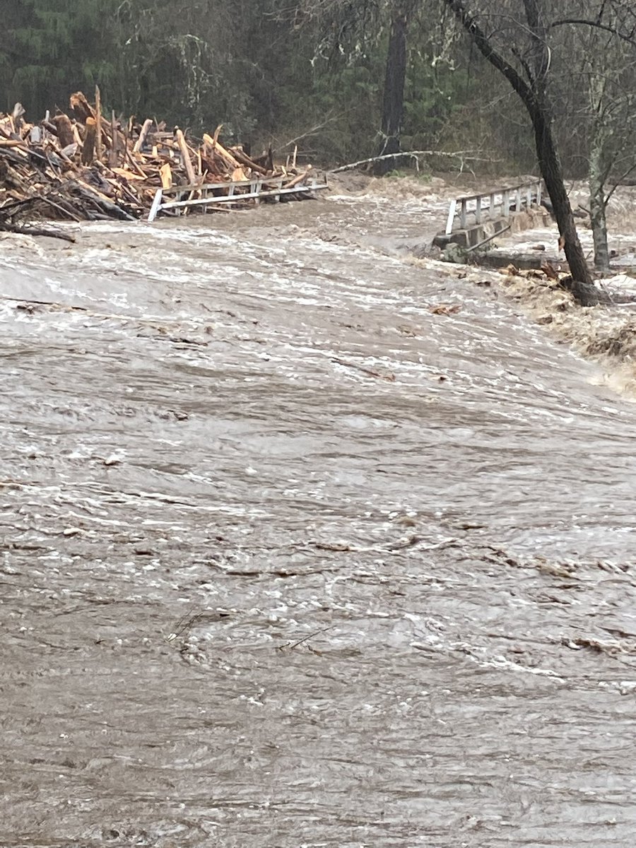 rcfong3's tweet photo. @CountyElDorado @kcranews Sweeney Bridge on N. Fork of Cosumnes River.  This is exactly what happened in 1997!  Sweeney Rd and Happy Valley Rd impassible for emergency access or evacuation of residents.  Equipment needed to clear areas around edges of bridge to allow water a pathway out! https://t.co/xj5CL2zmyD