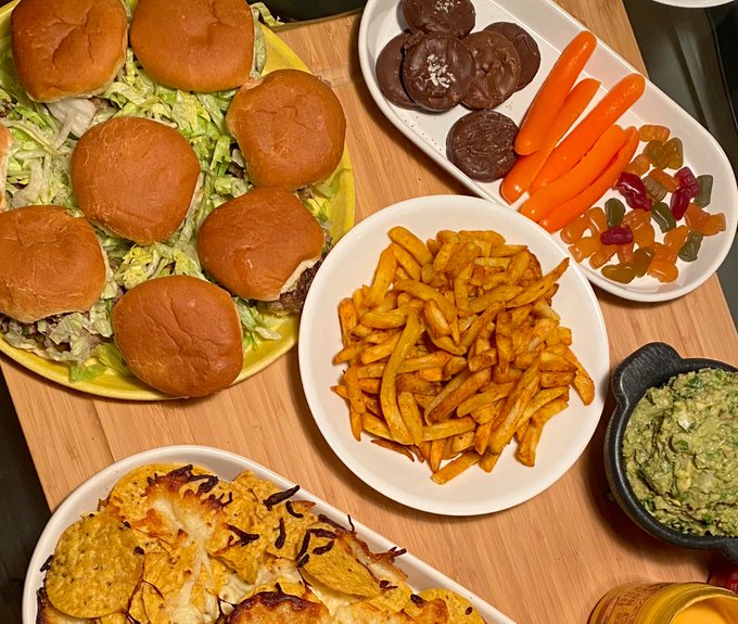 Homemade Sliders, french fries, nachos with guacamole, gummie bears &amp; cookies as a Charcuterie board<a href="/tag/happynewyear2023"class="tags"><span>#happynewyear2023</span></a>